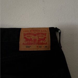 Levi's 550 Relaxed Fit Jeans in Black with Tan Patch